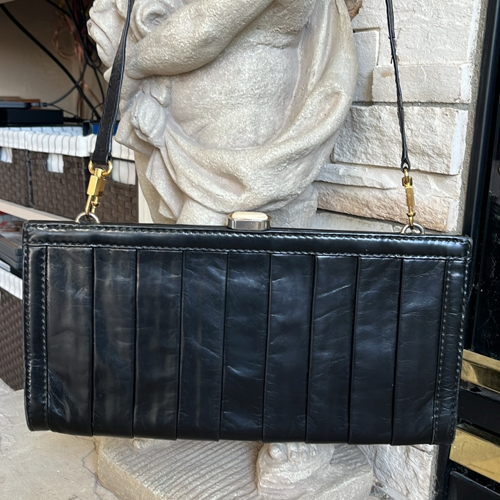 Vintage like new Magli blk leather clutch with shoulder strap & pleated leather
